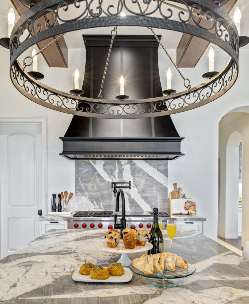 Oven hood and chandelier