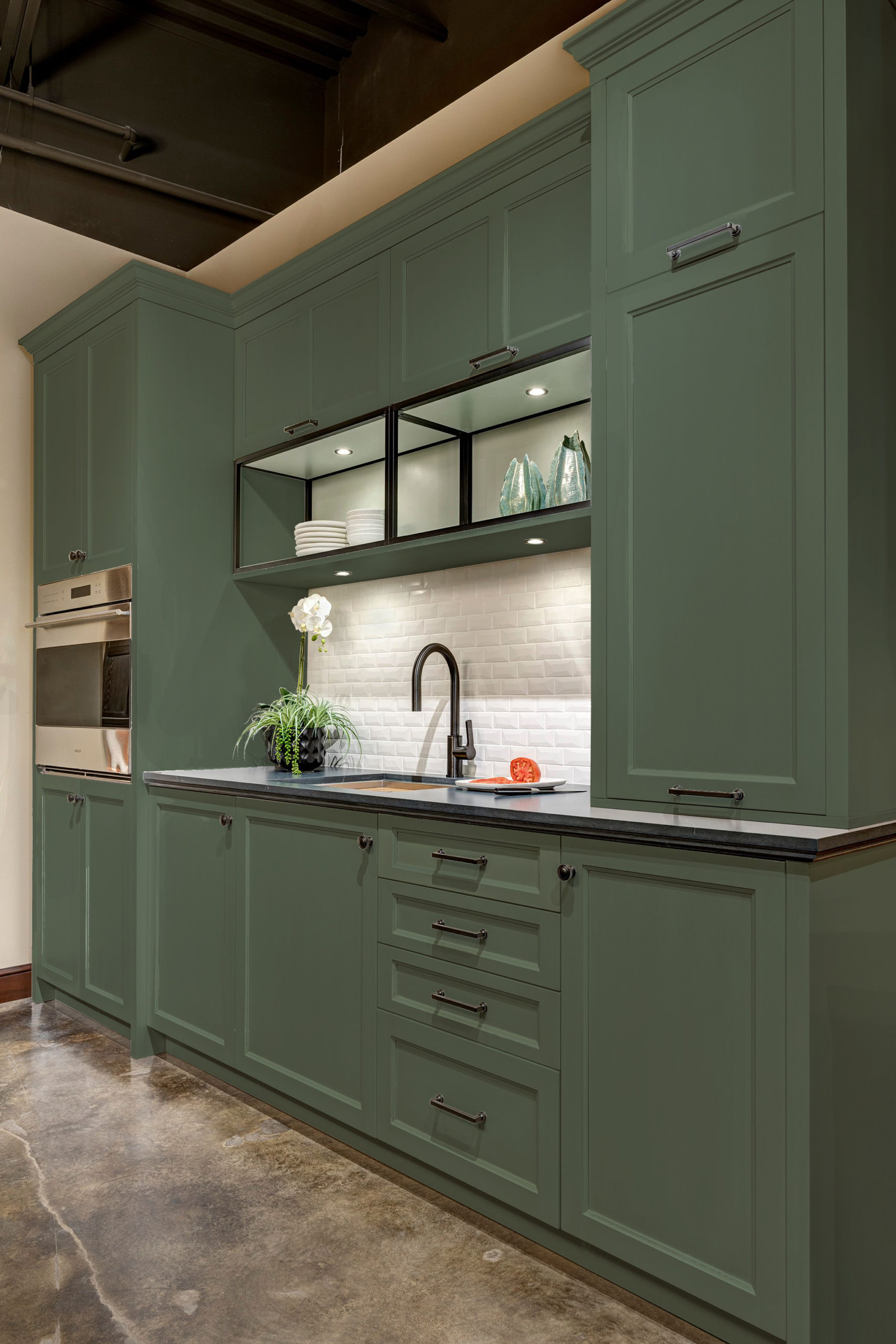 Kitchen cabinets painted in Vogue Green SW Color match