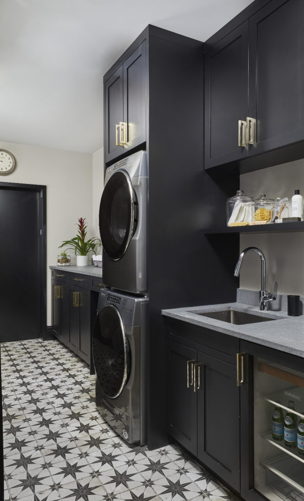 stacked washer/dryer unit in laundry space