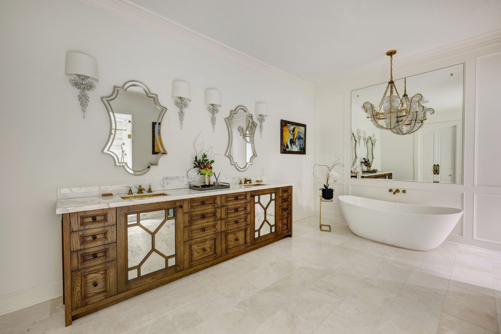 freestanding tub and custom cabinets in the primary bathroom