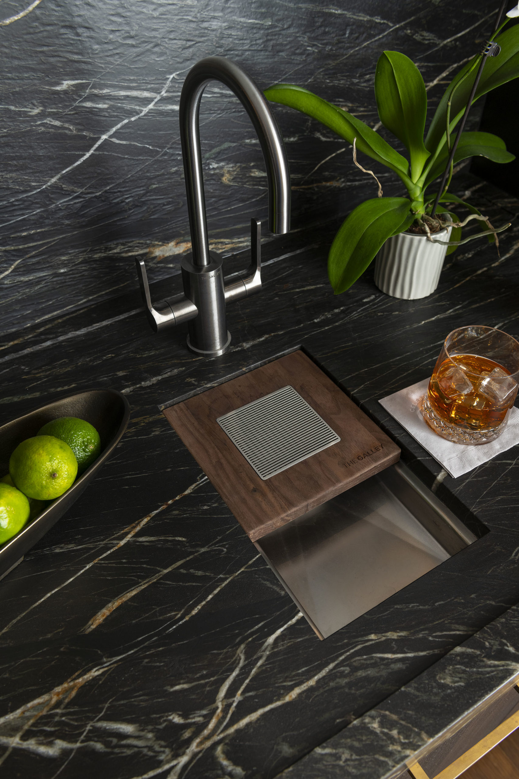 DLP_4388 Custom leathered stone covers the countertop