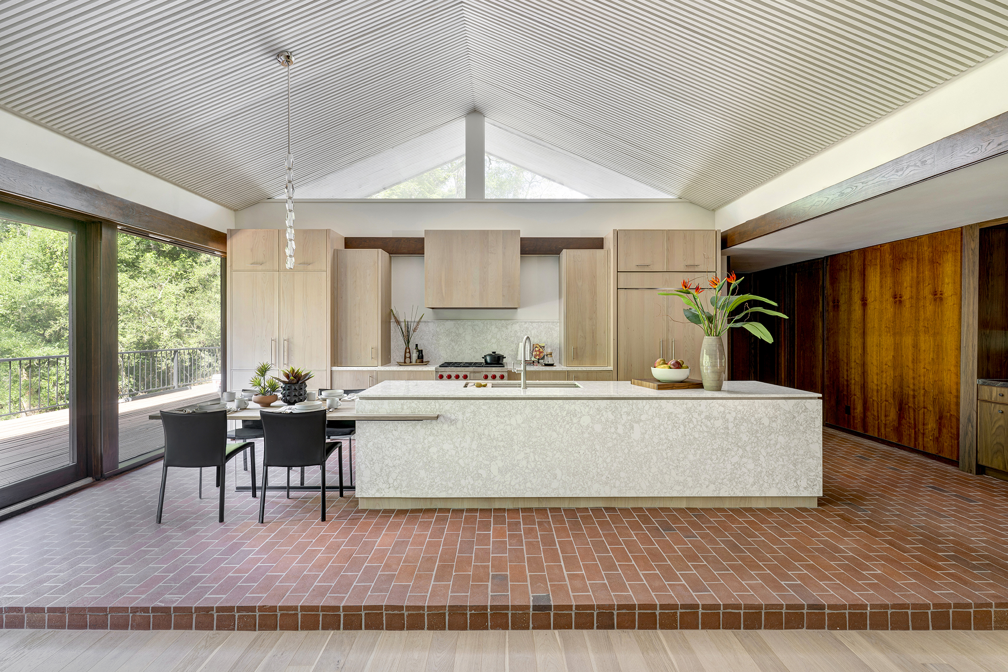 6w Vaulted ceilings in the renovated kitchen of the mid-century modern home