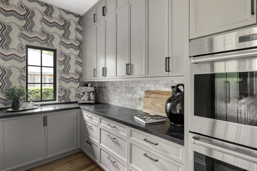 9w A double oven anchors the butler's pantry just off the kitchen.